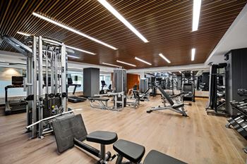 24-Hour fitness center with echelon reflect mirror & bikes